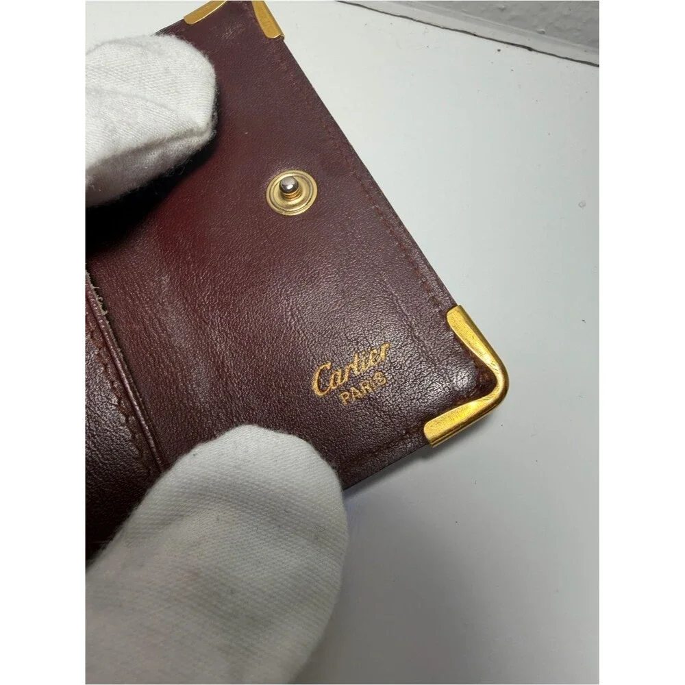 Cartier Brownish Red Leather Card Holder with Gold Corner Accents